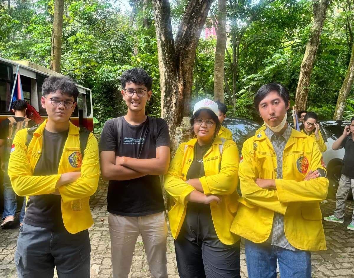 Wahyu and friends standing together outdoors
