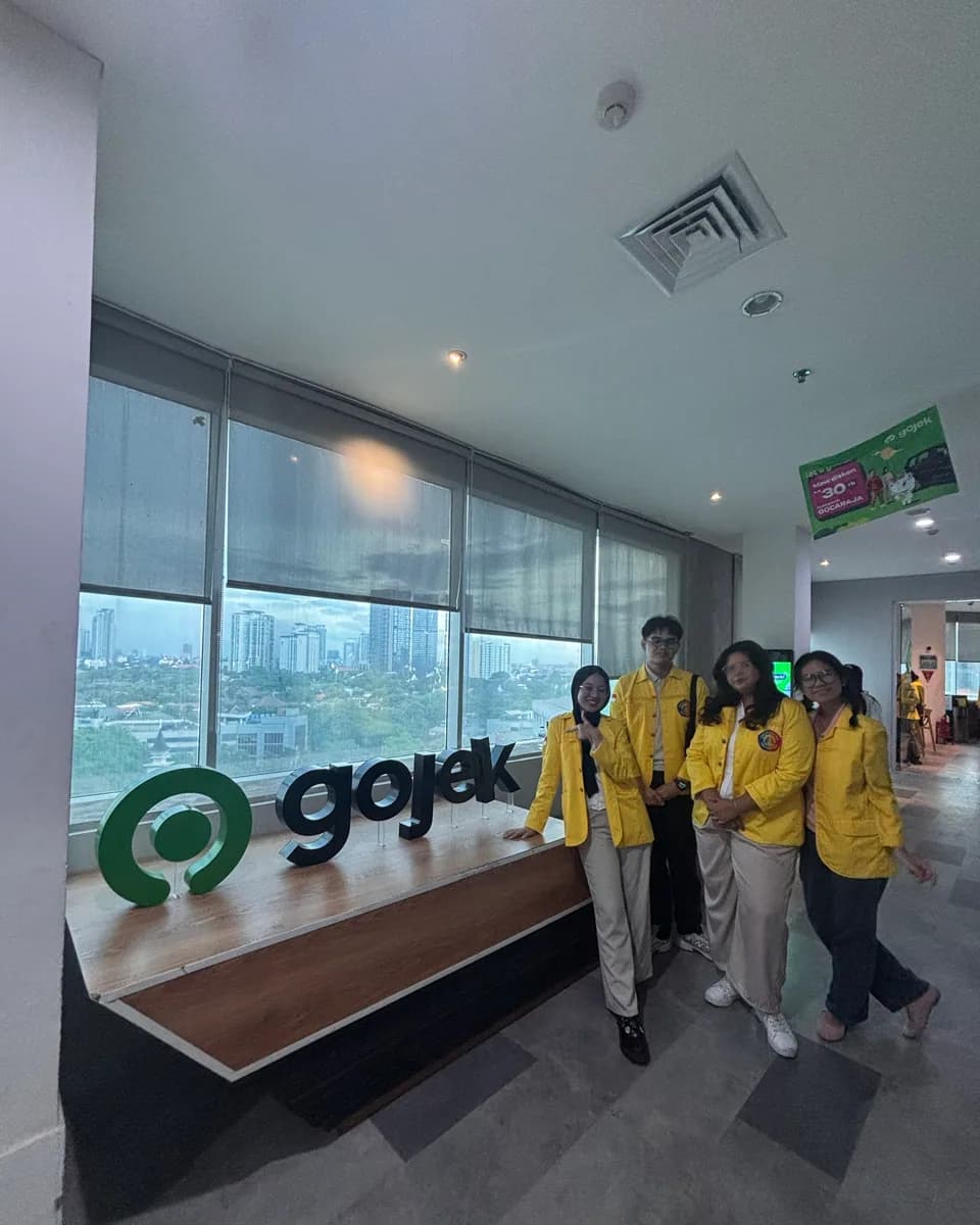 Wahyu and friends visiting a Gojek office