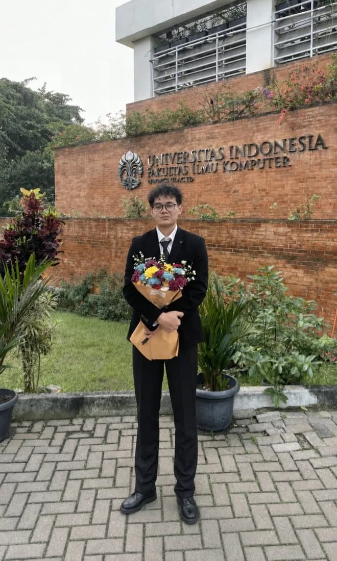 Wahyu at his thesis defense at Fakultas Ilmu Komputer UI