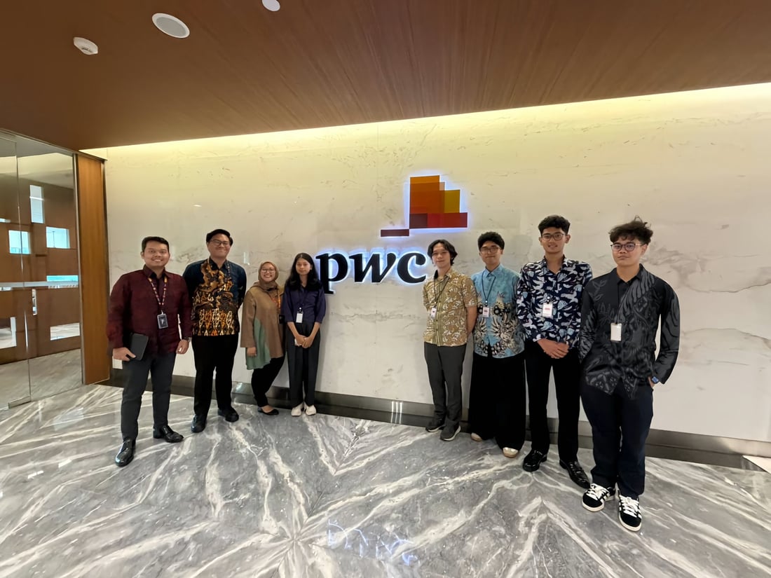 Wahyu with colleagues on a company visit to PwC