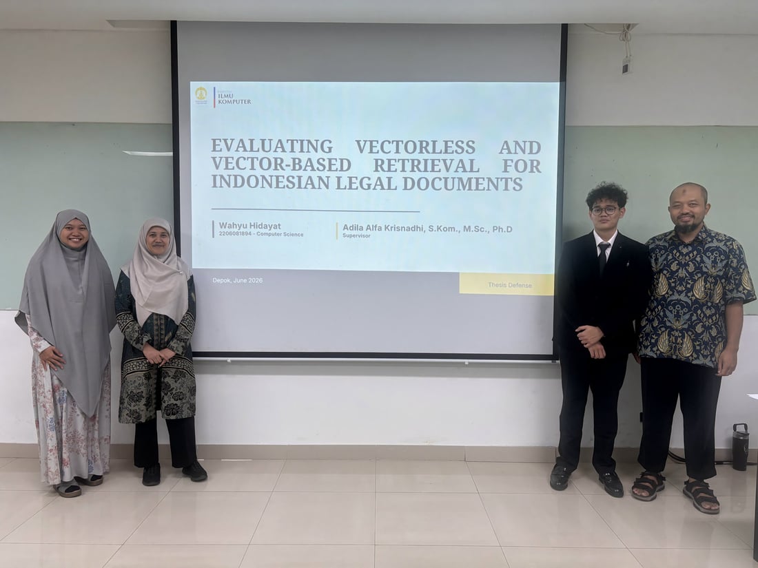 Wahyu presenting his thesis defense with the examining committee